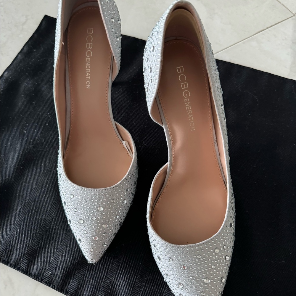 NEW BCBG generation Silver Pumps with clear beading. Size 7.5 4 “ heel